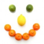 a smiling face made out of fruit