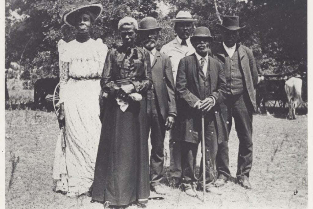 Black and white photo of people celebrating Emancipation Day (also known as 'Juneteenth') celebration June 19, 1900.