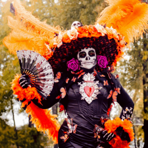 Woman in Día de los Muertos skeleton costume