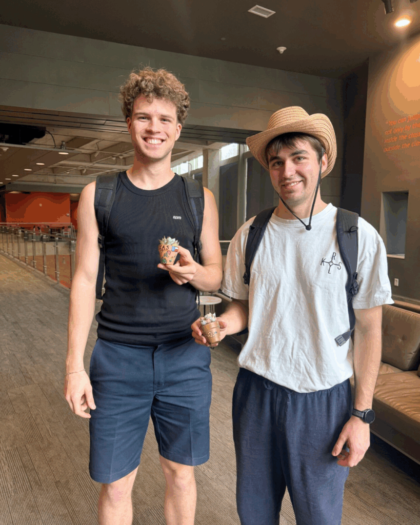More students with small plants