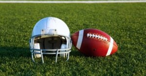 Football helmet and football ball