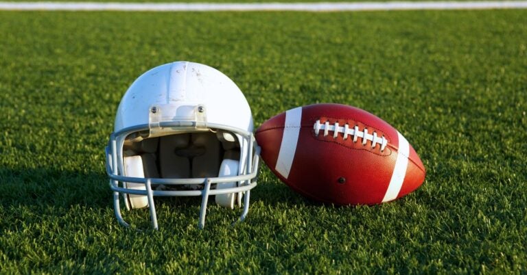 Football helmet and football ball