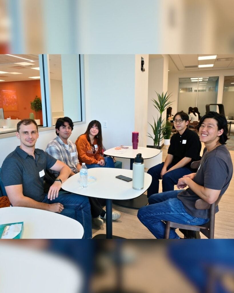 ISSS students at the Language Circles event sitting around tables.