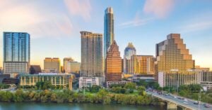 View the Austin city skyline from looking north across the river