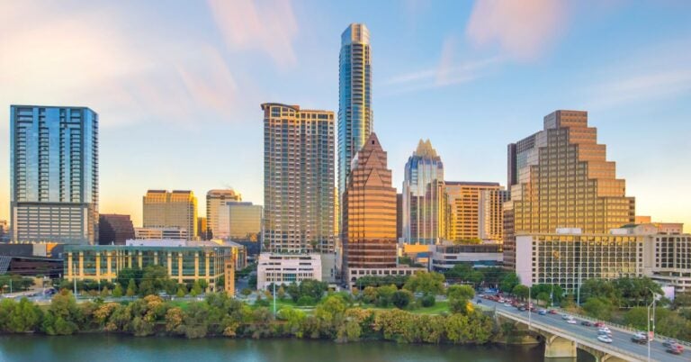 View the Austin city skyline from looking north across the river