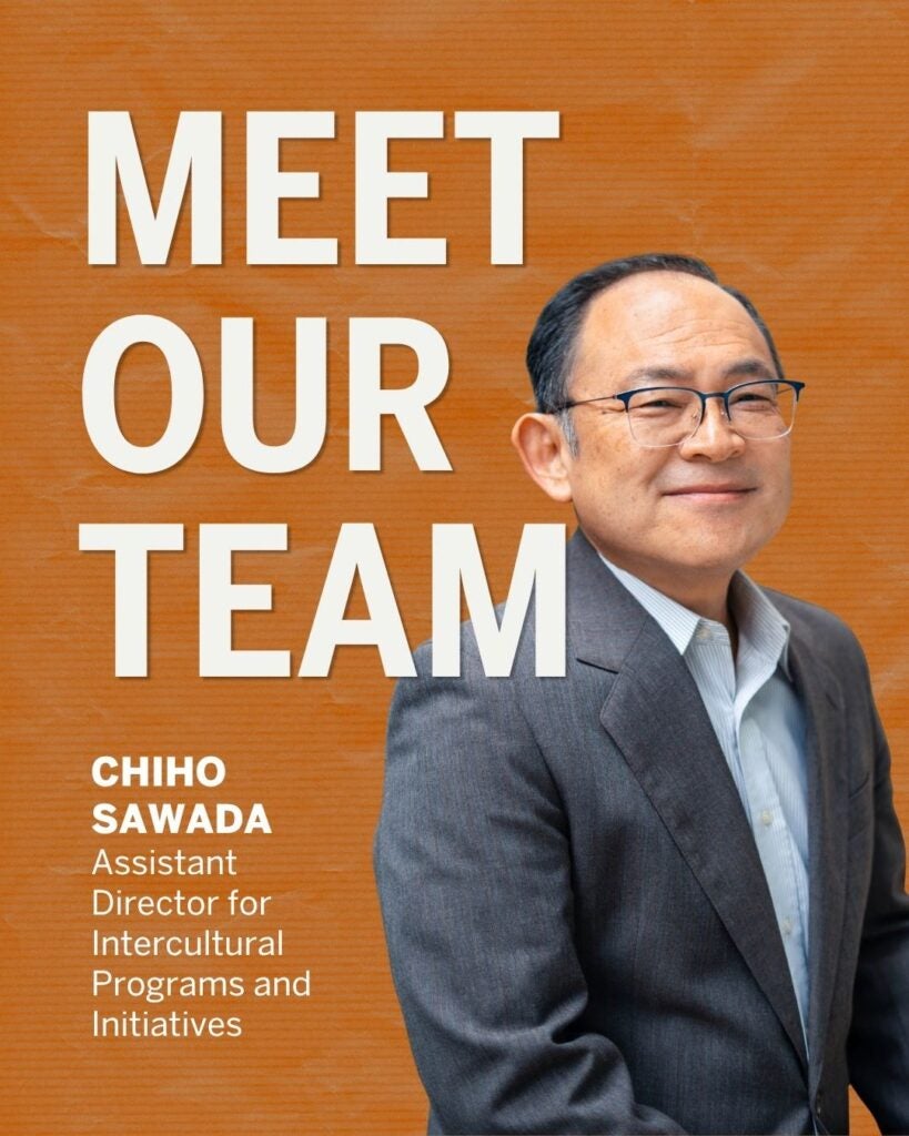 Portrait of Chiho Sawada, Assistant Director for Intercultural Programs and Initiatives, standing confidently against an orange background with 'Meet Our Team' text.